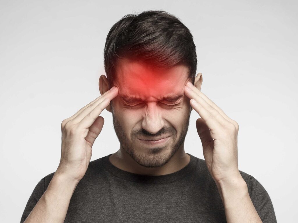 Chiropractor adjusting a patient in a calming clinic environment, emphasizing migraine relief